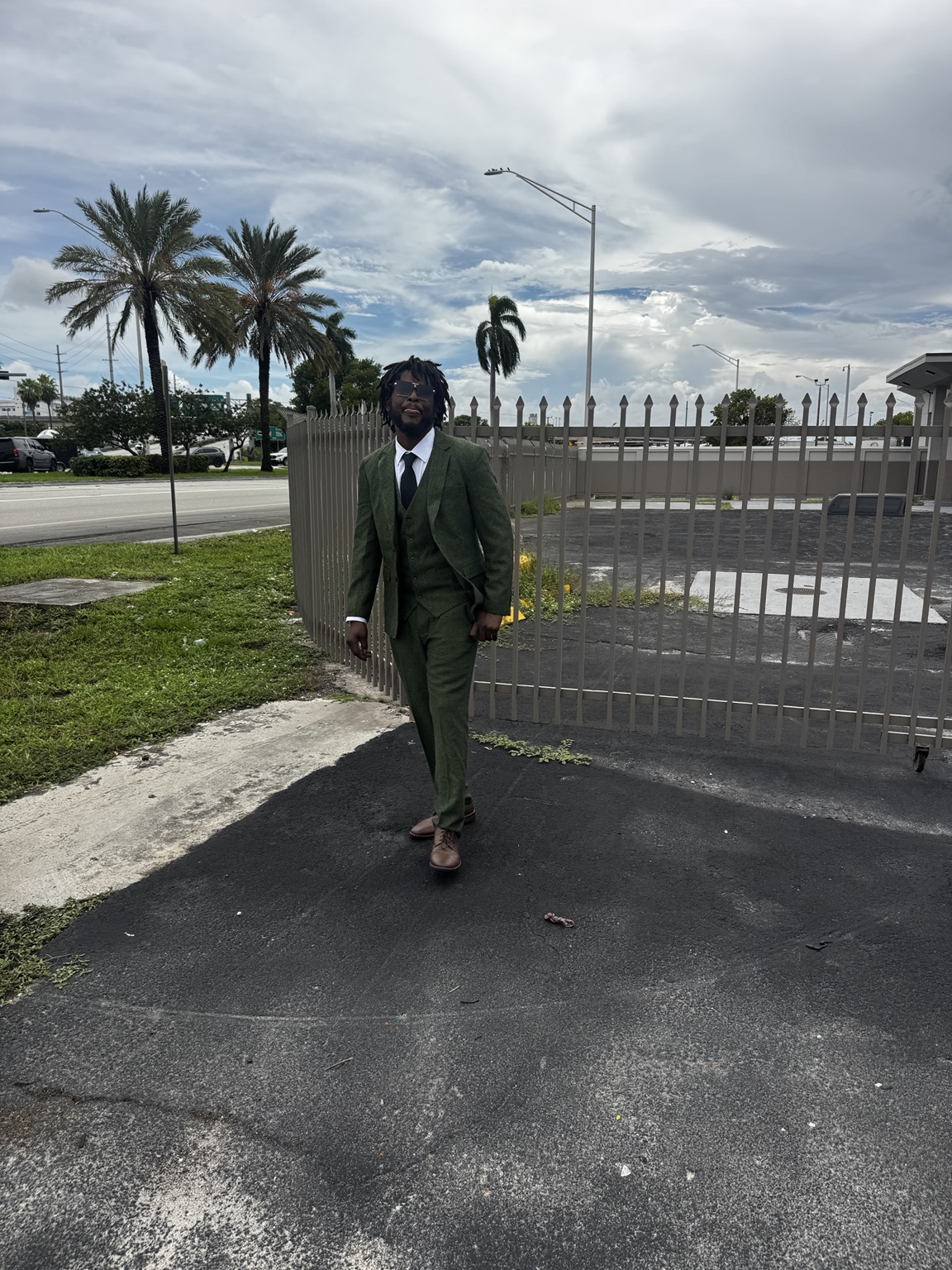 A wider view of the founder, entrance and surroundings at the Miami Gardens flagship location